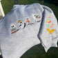 Cozy Ghost Embroidery Sweatshirt – Book Lover with Bat Sleeve Detail (SHIP 10/8)